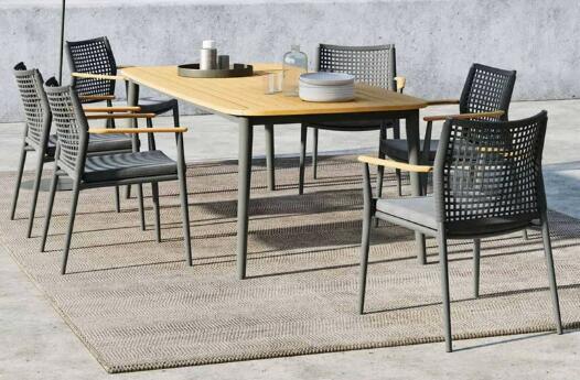 Outdoor teak wood table and 6pcs chairs made with weather resistant UV resistant and aluminum frame built for gardens courtyards and villas